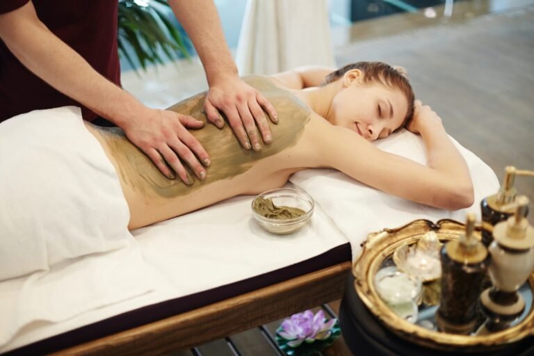 woman-enjoying-mud-massage-in-spa.jpg